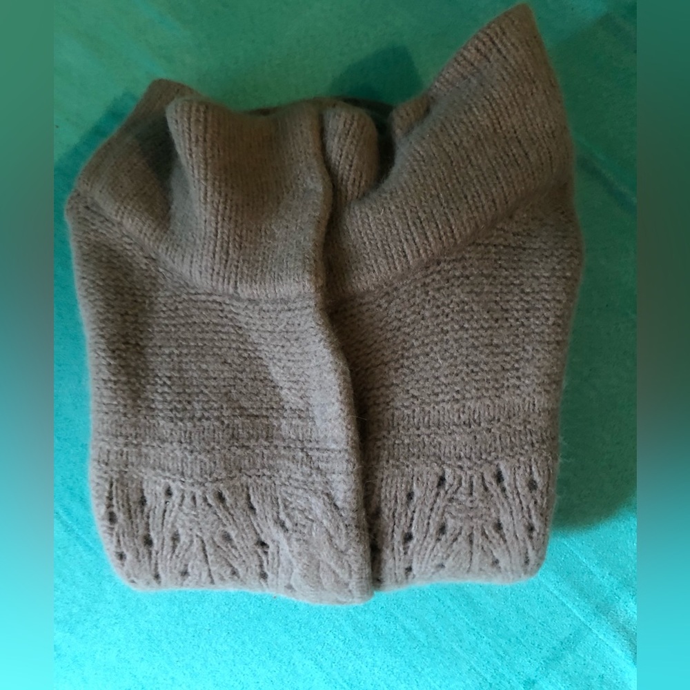Boutique sweater vest with snaps